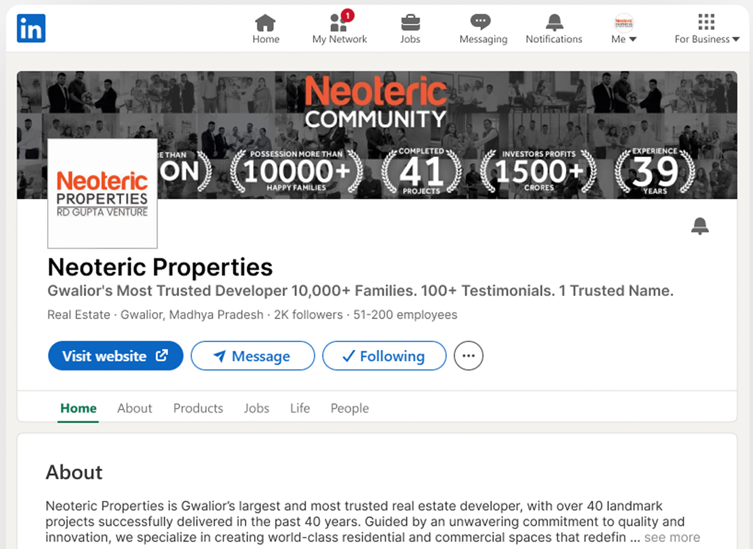 Two smiling colleagues discussing work